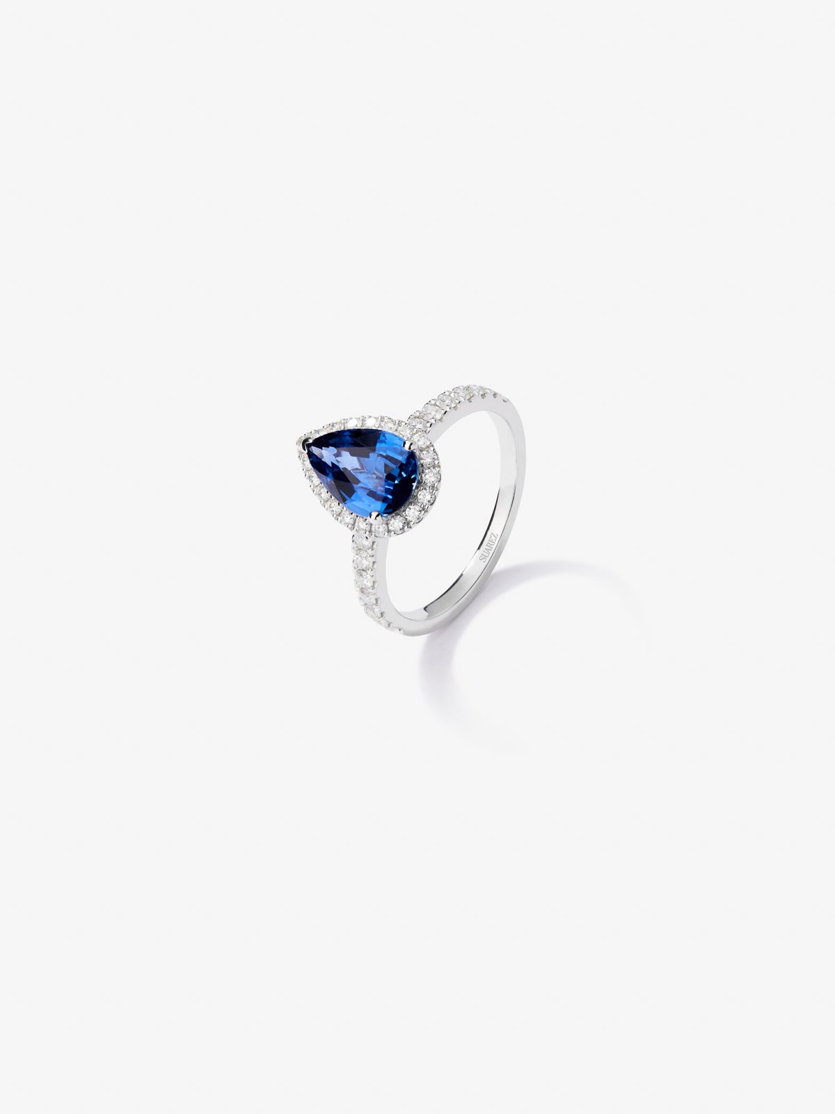 18K white gold ring with pear-cut blue sapphire of 2.35 cts and border and arm of 34 brilliant-cut diamonds with a total of 0.42 cts