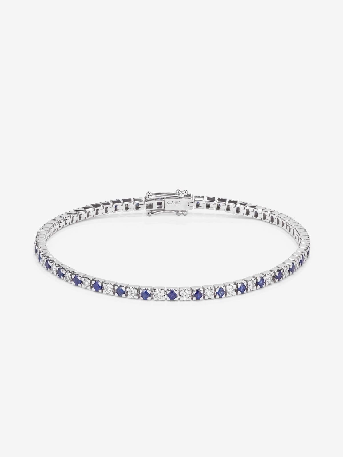 18K white gold bracelet with 37 brilliant-cut diamonds with a total of 0.88 cts and 38 brilliant-cut blue sapphires with a total of 0.95 cts