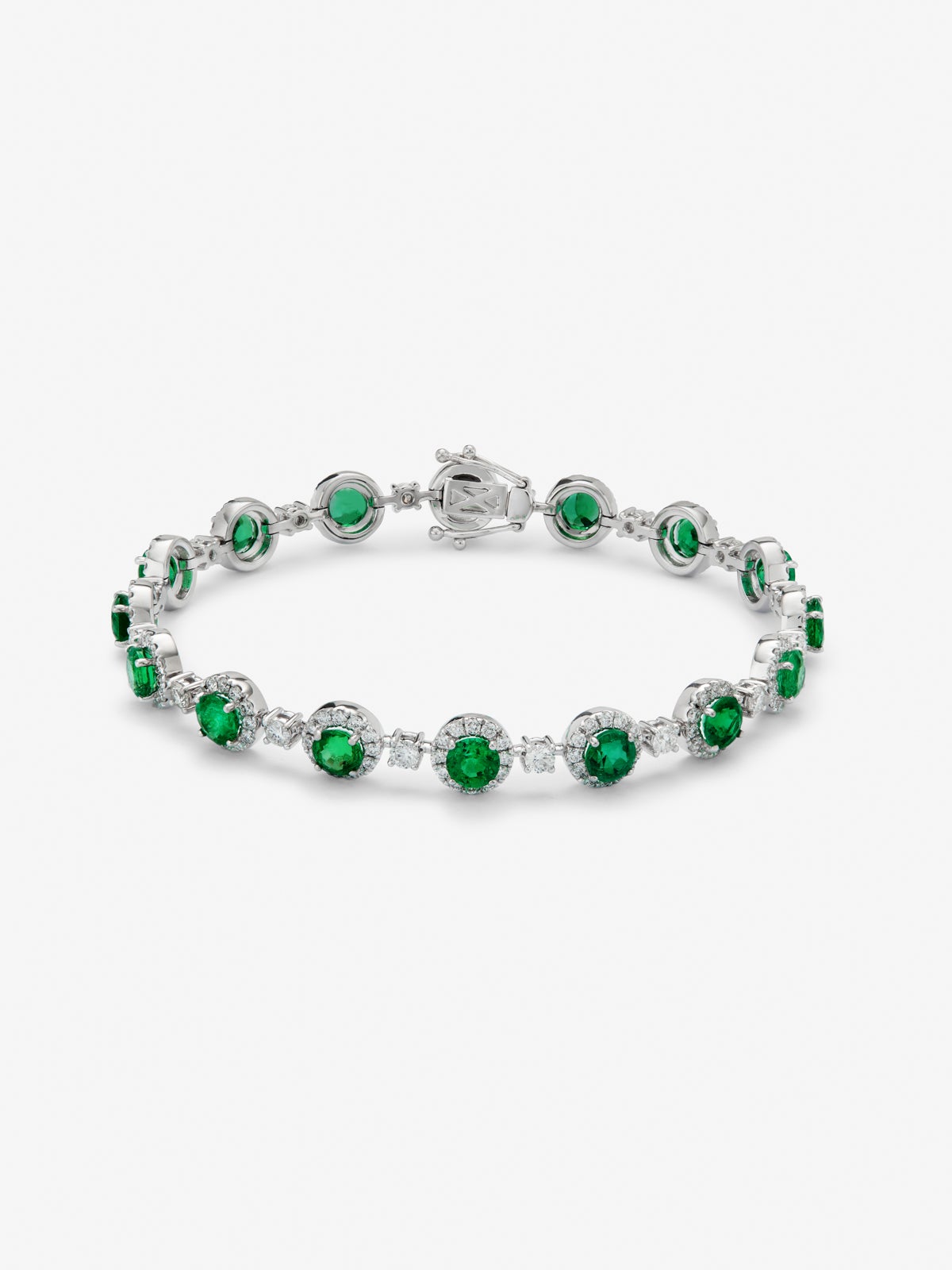 18K white gold bracelet with 16 brilliant-cut emeralds with a total of 5.58 cts and 208 brilliant-cut diamonds with a total of 2.73 cts
