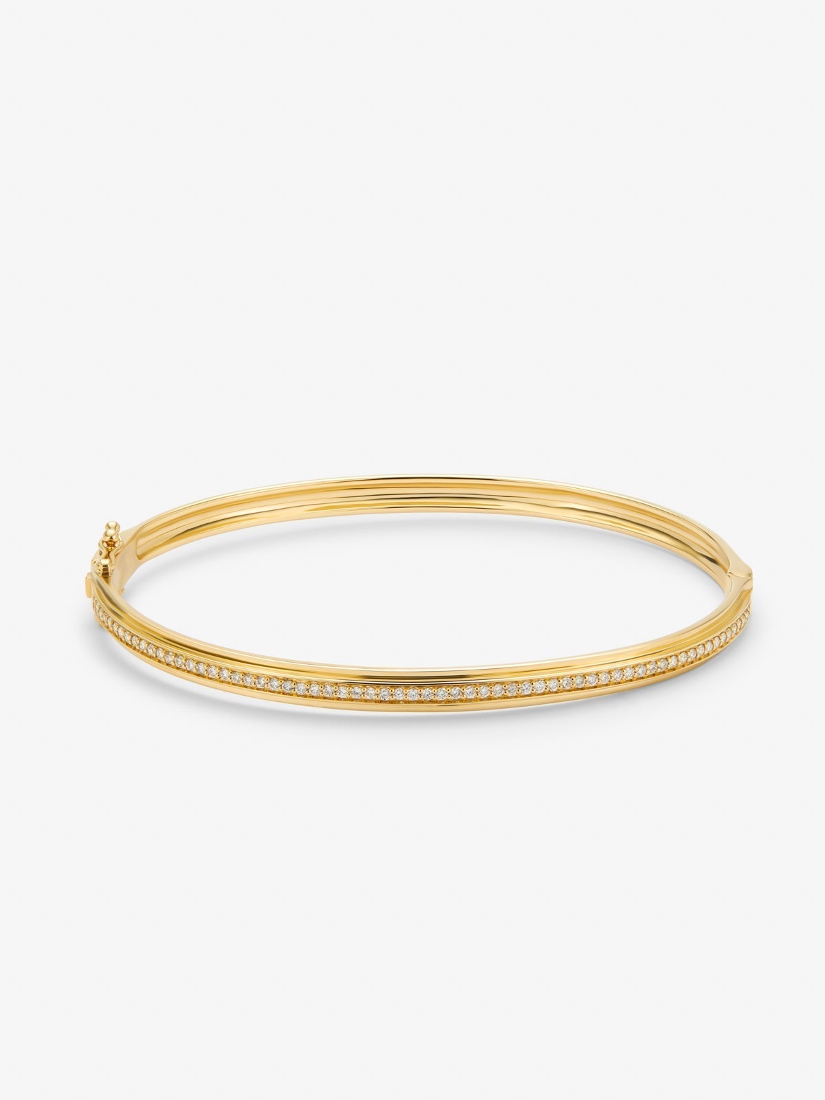 Rigid 18K yellow gold bracelet with 64 brilliant-cut diamonds with a total of 0.38 cts