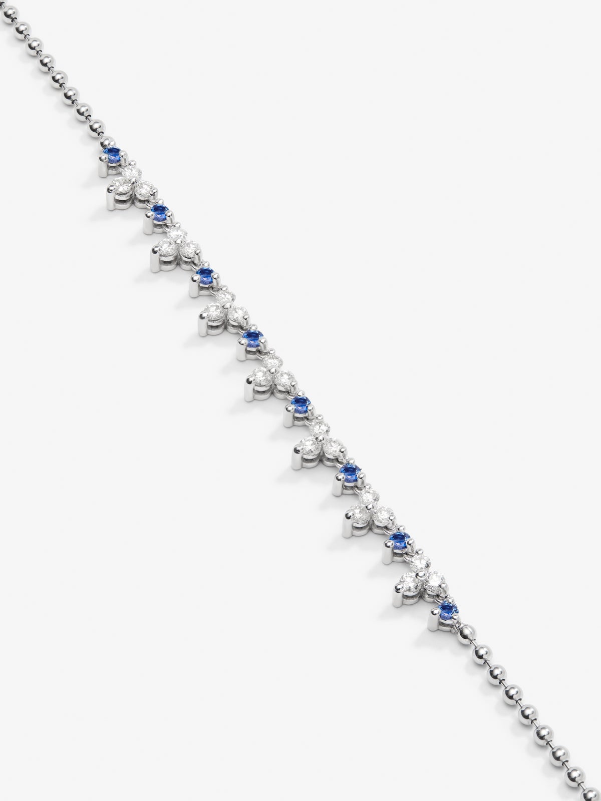18K white gold pendant with blue zafiros in bright size 1.35 cts and white diamonds of 1.25 cts