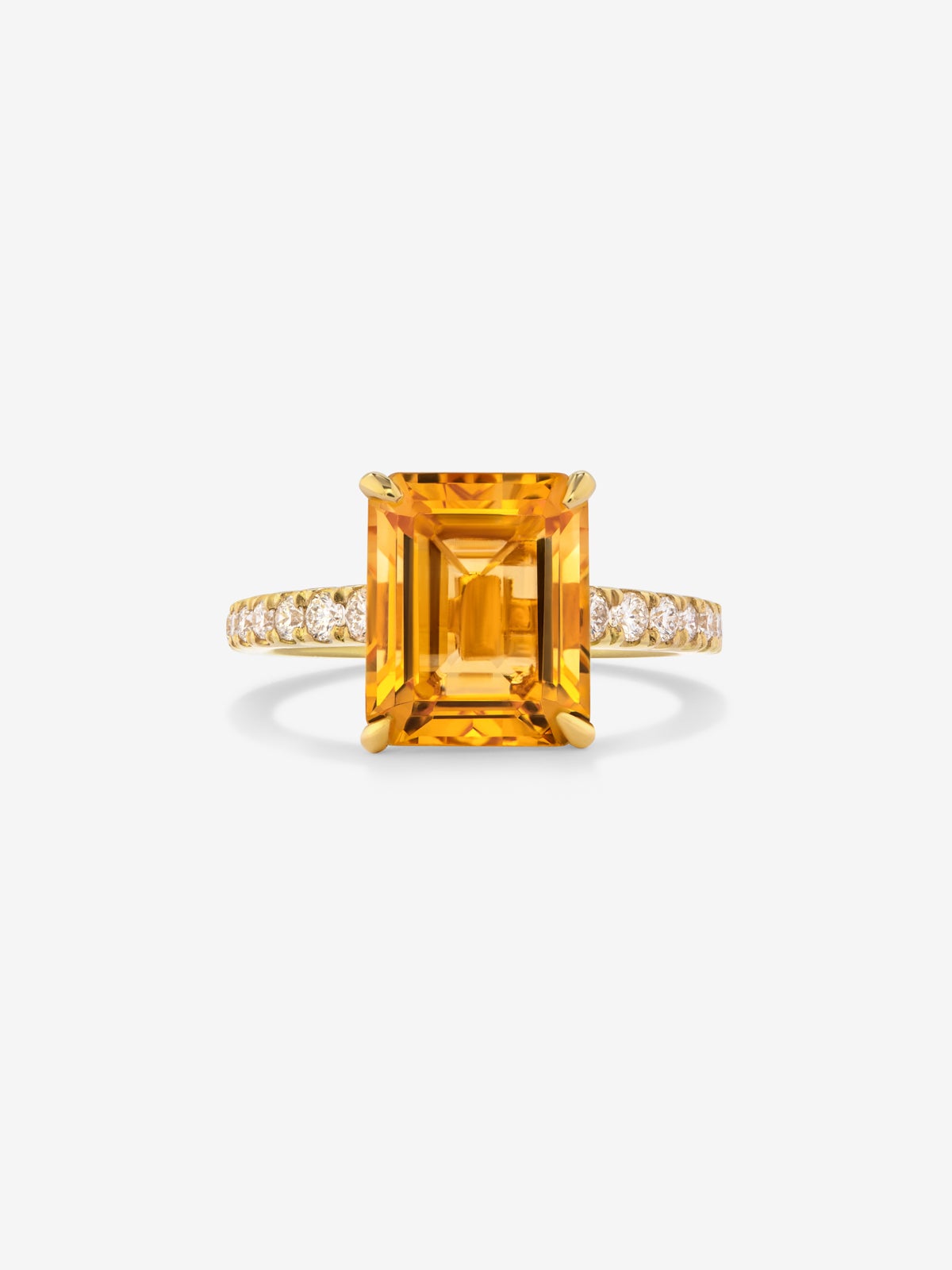 18K yellow gold ring with radiant cut citrine quartz of 1.2 cts and 18 brilliant cut diamonds with a total of 0.18 cts