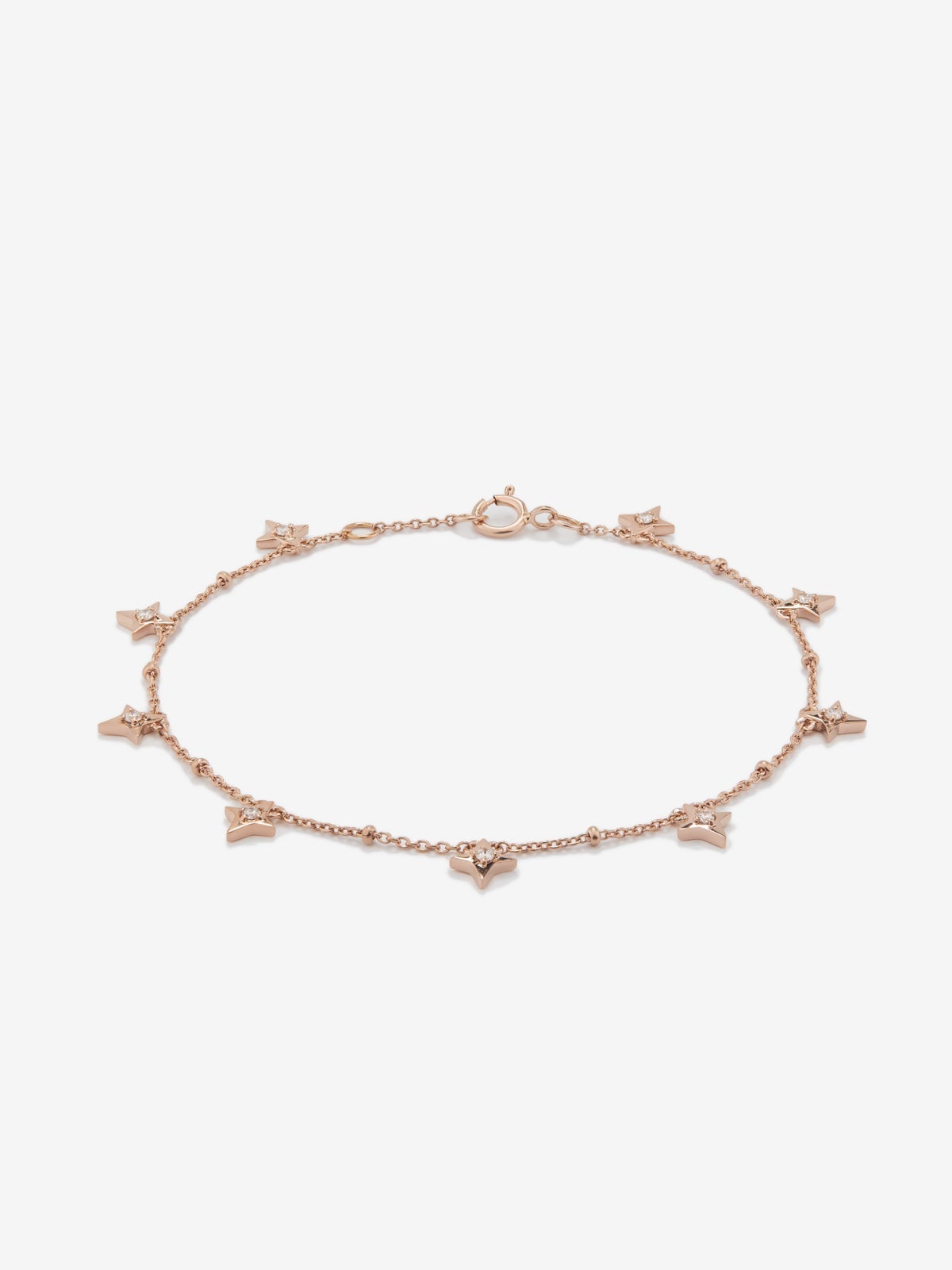 Pulsera cadena con estrellas de oro rosa de 18K con diamantes